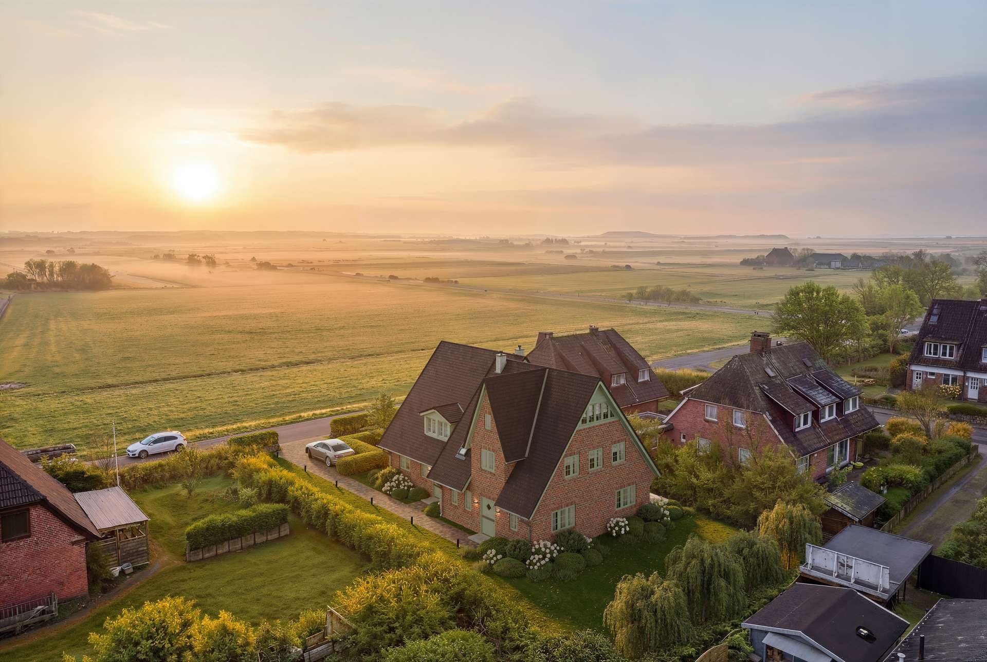 Luftbild mit Neubau-Visualisierung